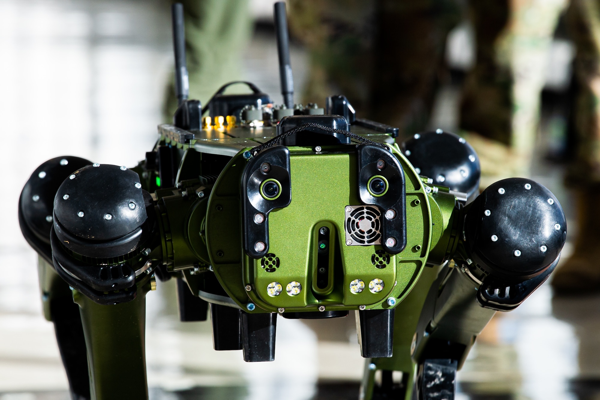 A close up photo of the front of a Ghost Robotics Vision 60 robot in Fairchild Hall, U.S. Air Force Academy, Colorado, February 8th 2023.