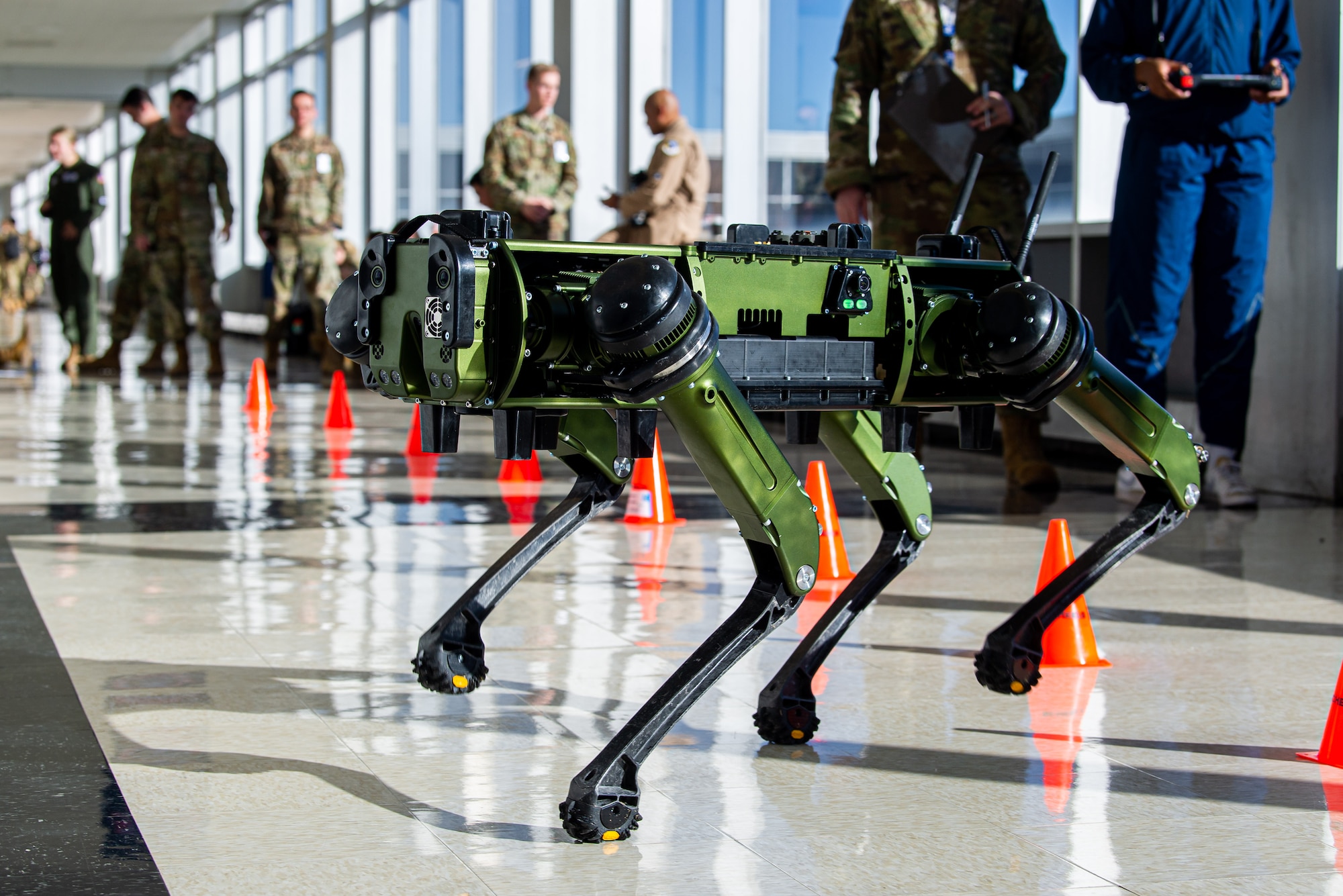 A robot navigates through orange cones in Fairchild Hall, U.S. Air Force Academy, Colorado, February 8th 2023.