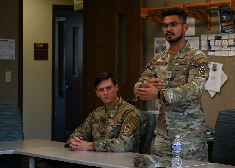 U.S. Air Force Staff Sgt. Julian Navarro, Safety occupational safety specialist, addresses the class during the first-ever Basic Enlisted Strategic Thinking joint professional development course at the Vandenberg Space Force Base Education Center from May 8-12, 2023. Fourteen Air and Space Force non-commissioned officers attended the joint professional development course and learned about critical and strategic thinking. (U.S. Space Force photo by Senior Airman Tiarra Sibley)