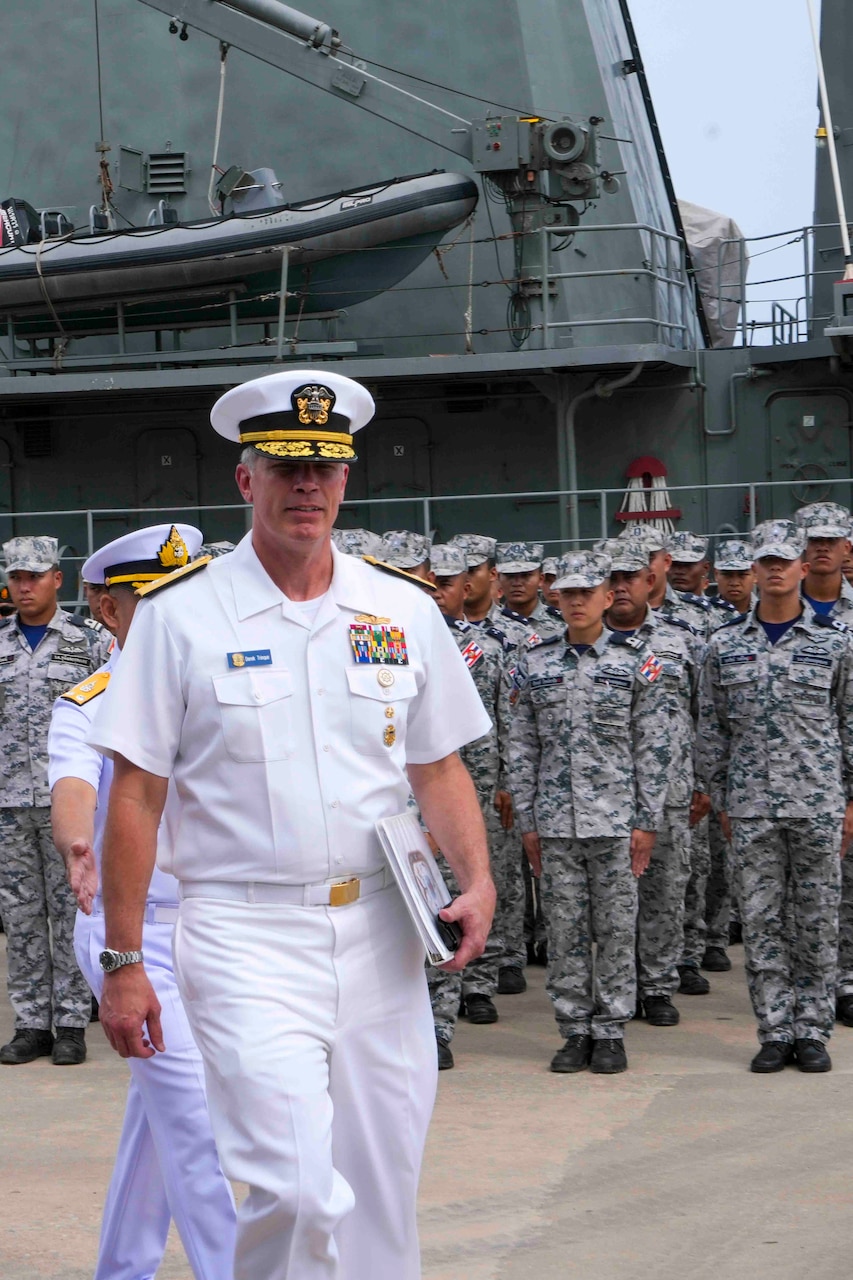 Rear Adm. Derek A. Trinque, commander Expeditionary Strike Group SEVEN/ Task Force 76 (ESG 7/ CTF 76) arrives for the opening ceremony of Cooperation Afloat Readiness and Training (CARAT)/Marine Exercise (MAREX) Thailand 2023 at Royal Thai Fleet Headquarters, May 8. CARAT/MAREX Thailand is a bilateral exercise between the Kingdom of Thailand and United States to promote regional security cooperation, practice humanitarian assistance and disaster relief, and strengthen maritime understanding, partnerships and interoperability. Thailand has been part of the CARAT exercise series since 1995. In its 29th year, the CARAT series is comprised of multinational exercises, designed to enhance U.S. and partner forces’ abilities to operate together in response to traditional and non-traditional maritime security challenges in the Indo-Pacific region.