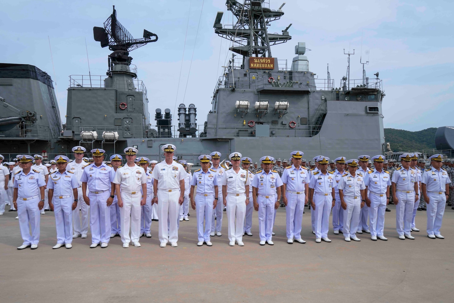 U.S. and Royal Thai Navy personnel take a photo with Rear Adm. Derek A. Trinque, commander Expeditionary Strike Group SEVEN/ Task Force 76 (ESG 7/ CTF 76) during the opening ceremony of Cooperation Afloat Readiness and Training (CARAT)/Marine Exercise (MAREX), 2023 at Royal Thai Fleet Headquarters, May 8. CARAT/MAREX Thailand is a bilateral exercise between the Kingdom of Thailand and United States to promote regional security cooperation, practice humanitarian assistance and disaster relief, and strengthen maritime understanding, partnerships and interoperability. Thailand has been part of the CARAT exercise series since 1995. In its 29th year, the CARAT series is comprised of multinational exercises, designed to enhance U.S. and partner forces’ abilities to operate together in response to traditional and non-traditional maritime security challenges in the Indo-Pacific region.