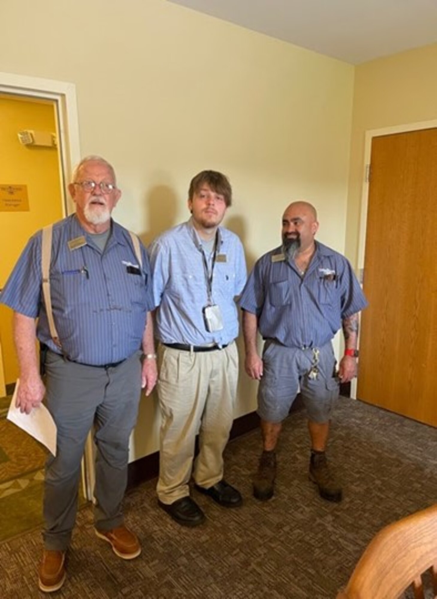 Courtesy photo of Dylan Landry, Project SEARCH intern, working with Maintenance staff members in Lodging.