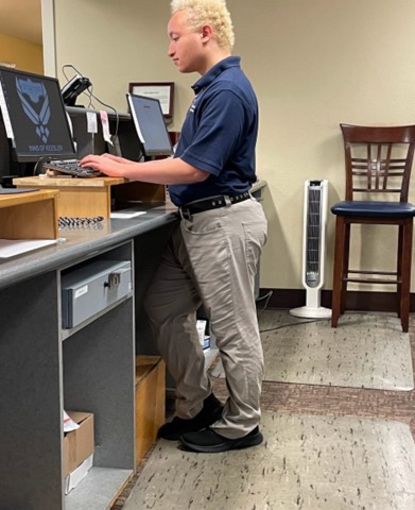 Courtesy photo of Charles Mueller, Project SEARCH intern, learning guest services skills while working with Keesler Air Force Base Lodging.