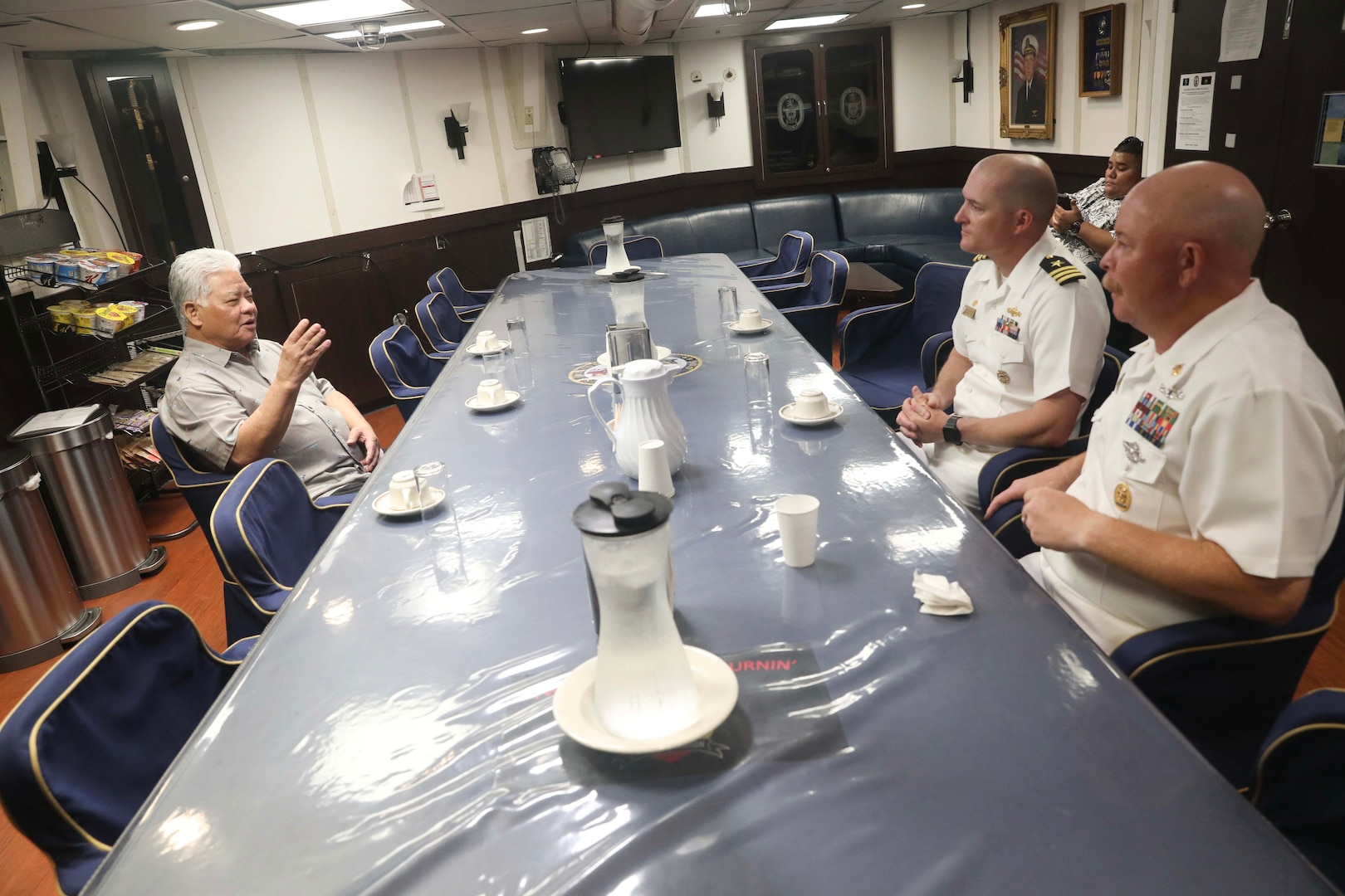 Arnold Palacios (left), governor of the Commonwealth of the Northern Mariana Islands, meets with Cmdr. Leif Gunderson (center), commanding officer of the Arleigh Burke-class guided-missile destroyer USS Milius (DDG 69), and Command Master Chief Troy Bojorquiz during a scheduled port visit. Milius is assigned to Commander, Task Force 71/Destroyer Squadron (DESRON) 15, the Navy’s largest forward-deployed DESRON and the U.S. 7th Fleet’s principal surface force.