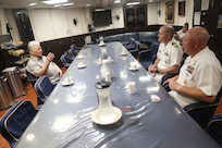 Arnold Palacios (left), governor of the Commonwealth of the Northern Mariana Islands, meets with Cmdr. Leif Gunderson (center), commanding officer of the Arleigh Burke-class guided-missile destroyer USS Milius (DDG 69), and Command Master Chief Troy Bojorquiz during a scheduled port visit. Milius is assigned to Commander, Task Force 71/Destroyer Squadron (DESRON) 15, the Navy’s largest forward-deployed DESRON and the U.S. 7th Fleet’s principal surface force.