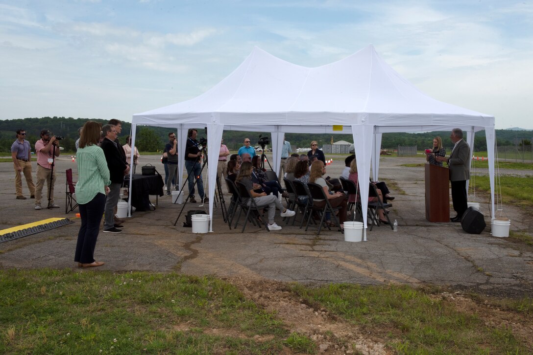 Ken Rueter (at podium), UCOR president and CEO, recognizes the full life cycle of the former K-25 Building during a groundbreaking ceremony for the K-25 Viewing Platform May 11, 2023, in Oak Ridge, Tennessee. (USACE Photo by Lee Roberts)