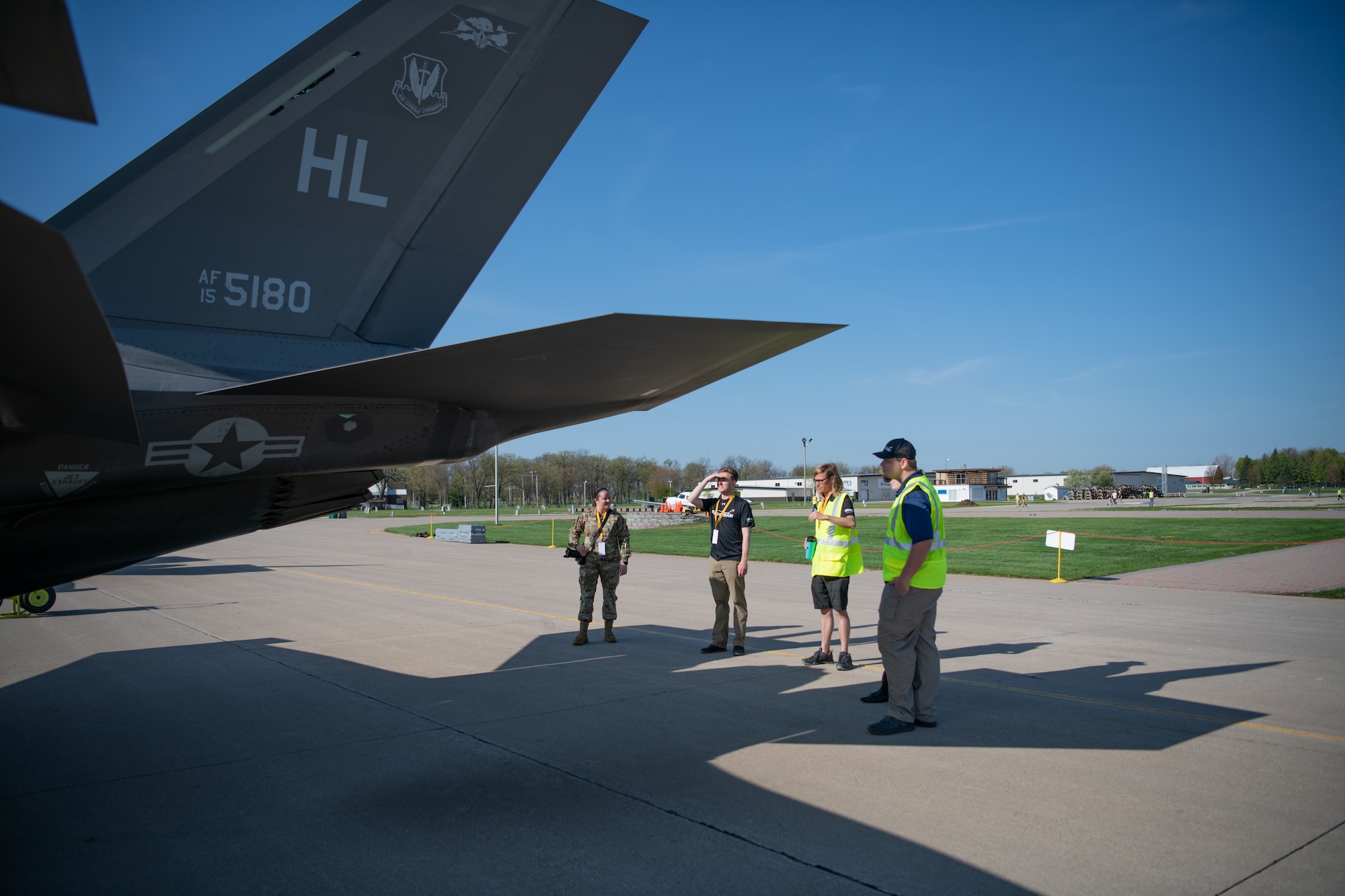 An Airman and collegiate aviators tour an F-35 Lighting II aircraft