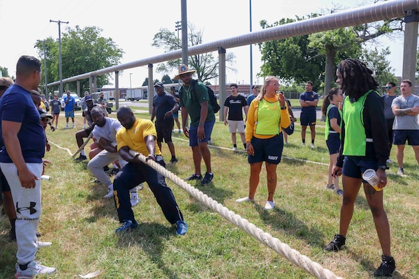 NORFOLK (May 12, 2023) USS Iwo Jima (LHD 7) Sailors compete in tug-of-war during Surface Like Week at McCormick Field, May 12. Surface Line Week is an opportunity to build comradery and teamwork not only for individual commands, but fleet-wide.(U.S. Navy photo by Mass Communication Specialist Seaman Chloe Le)