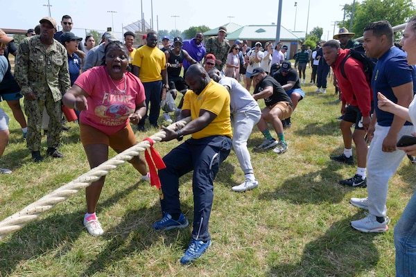 USS Iwo Jima (LHD 7) Sailors compete in tug-of-war during Surface Like Week at McCormick Field, May 12. Surface Line Week is an opportunity to build comradery and teamwork not only for individual commands, but fleet-wide.(U.S. Navy photo by Mass Communication Specialist Seaman Chloe Le)