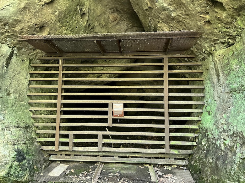 Cave with horizontal bars on it.