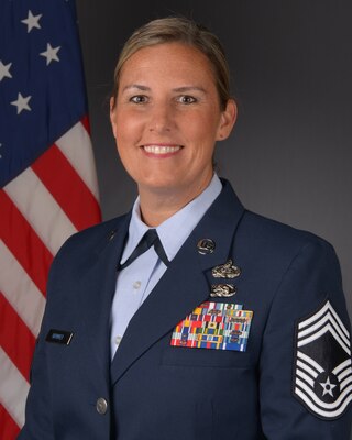U.S. Air Force Chief Master Sgt. Rachel Hammer, 561st Network Operations Squadron Senior Enlisted Leader poses for an official photo. Hammer advises the commander on all enlisted matters that provide cyberspace operations, cyber effects, planning, support and sustainment activities across the Air Force Information Networks. (Courtesy photo)