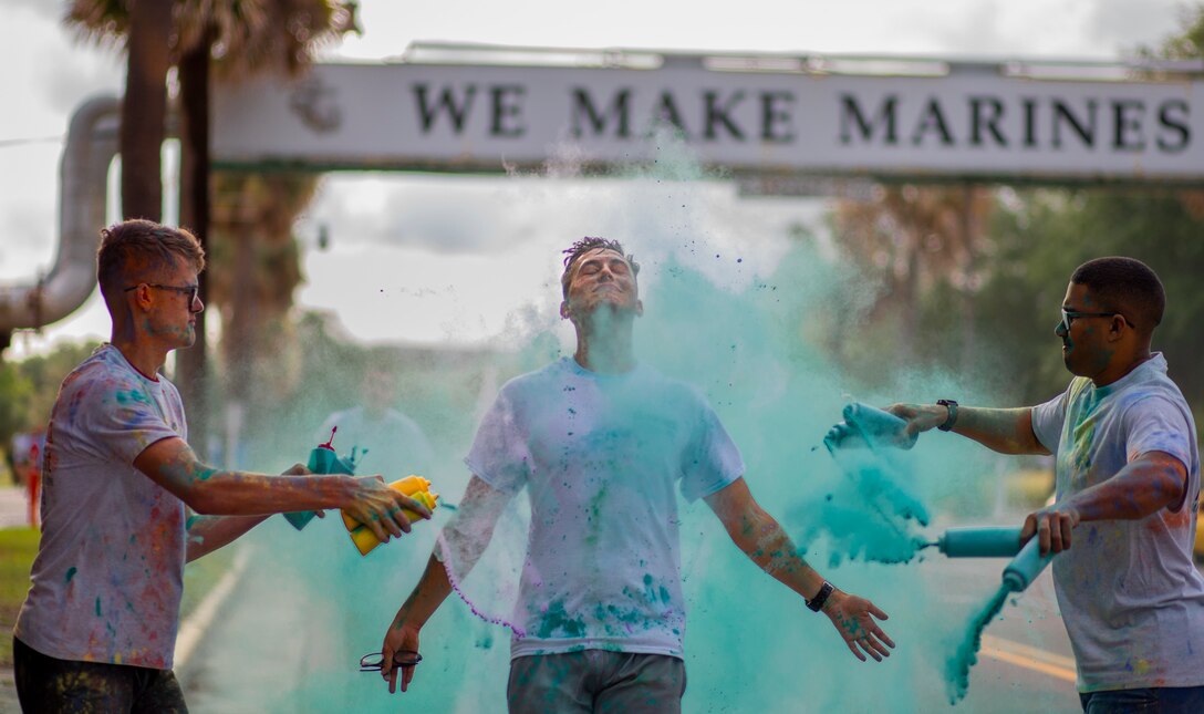 U.S. Marines, sailors and civilians with the Tri-Command and the Eastern Recruiting Region participate in a Color Run on Marine Corps Recruit Depot Parris Island, S.C., April 28, 2023. The color run was in support of Sexual Assault and Awareness Prevention Month. (U.S. Marine Corps photo by Pfc. Mary Jenni)