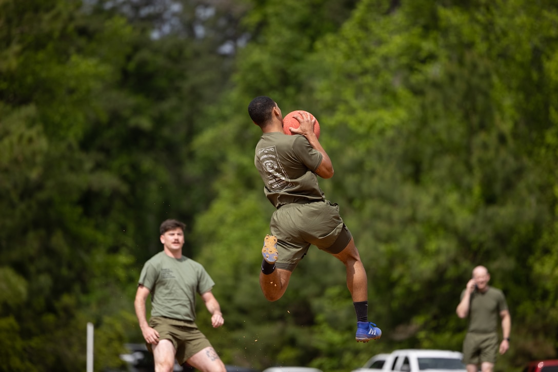 U.S. Marines with 2d Marine Division participate in kickball during a Sexual Assault Prevention and Response (SAPR) awareness field meet on Camp Lejeune, North Carolina, April 27, 2023. The field meet fostered awareness, prevention, competition, and camaraderie between Marines and Sailors of 2d Marine Division while contributing to a better understanding of sexual assault, the factors contributing to its occurrence and prevention. (U.S. Marine Corps photos by Lance Cpl. Ryan Ramsammy)