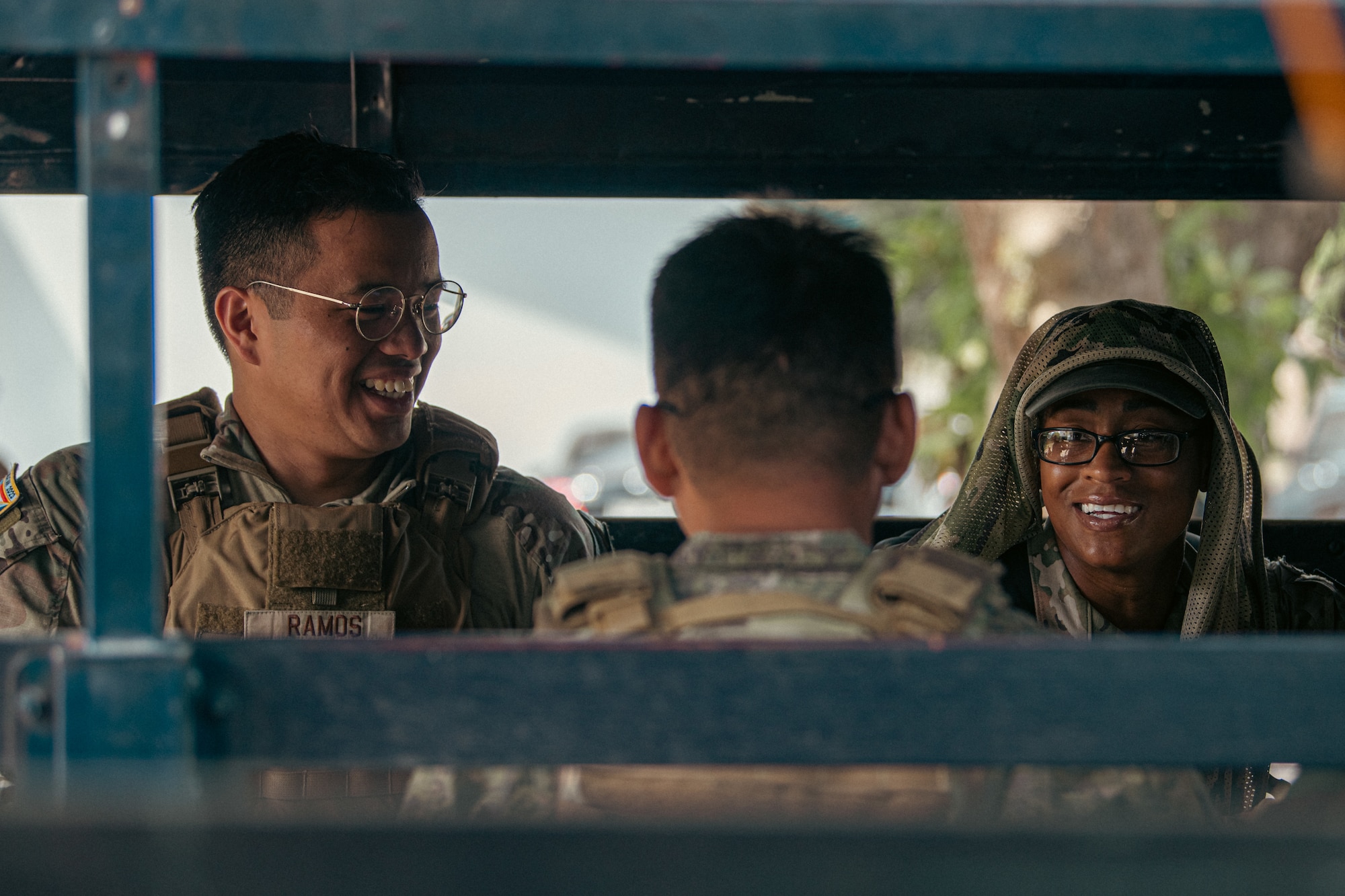 a photo of airmen sitting and smiling