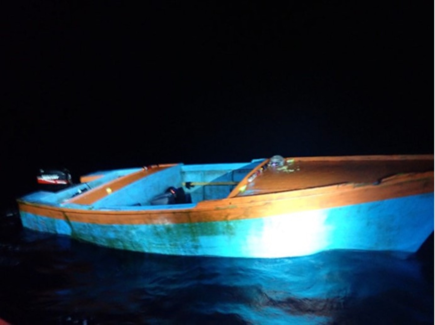 A makeshift vessel interdicted by the Coast Guard Cutter Winslow Griesser May 12, 2023; drifts empty in the Mona Passage.  The cutter repatriated 33 migrants from this voyage to the Dominican Republic May 13, 2023, while three other migrants in the group are facing federal prosecution in Puerto Rico.  (U.S. Coast Guard photo)