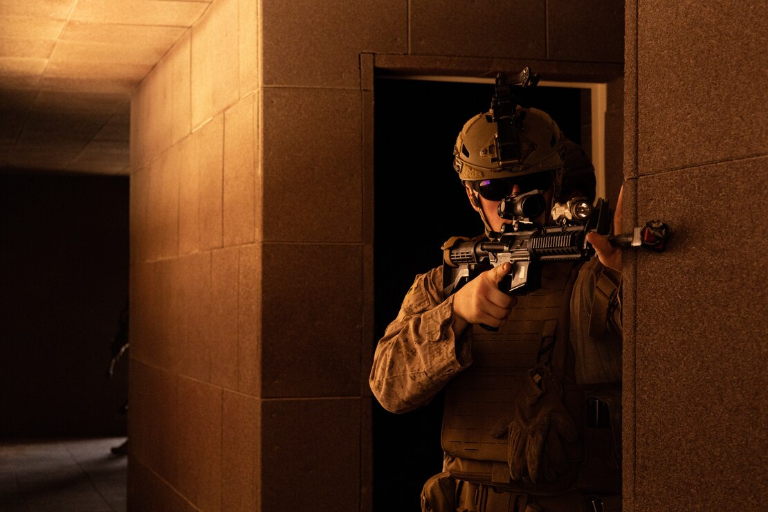 U.S. Marine Corps LCpl. Nicholas Suhr with Marine Forces Command simulates holding security during Intrepid Maven 23.3 at United Arab Emirates, May 14, 2023. Intrepid Maven 23.3 is a Task Force 51/5-led bilateral exercise between MARCENT and the United Arab Emirates Armed Forces designed to improve interoperability, strengthen partner-nation relationships in the U.S. Central Command area of operations and improve both individual and bilateral unit readiness.