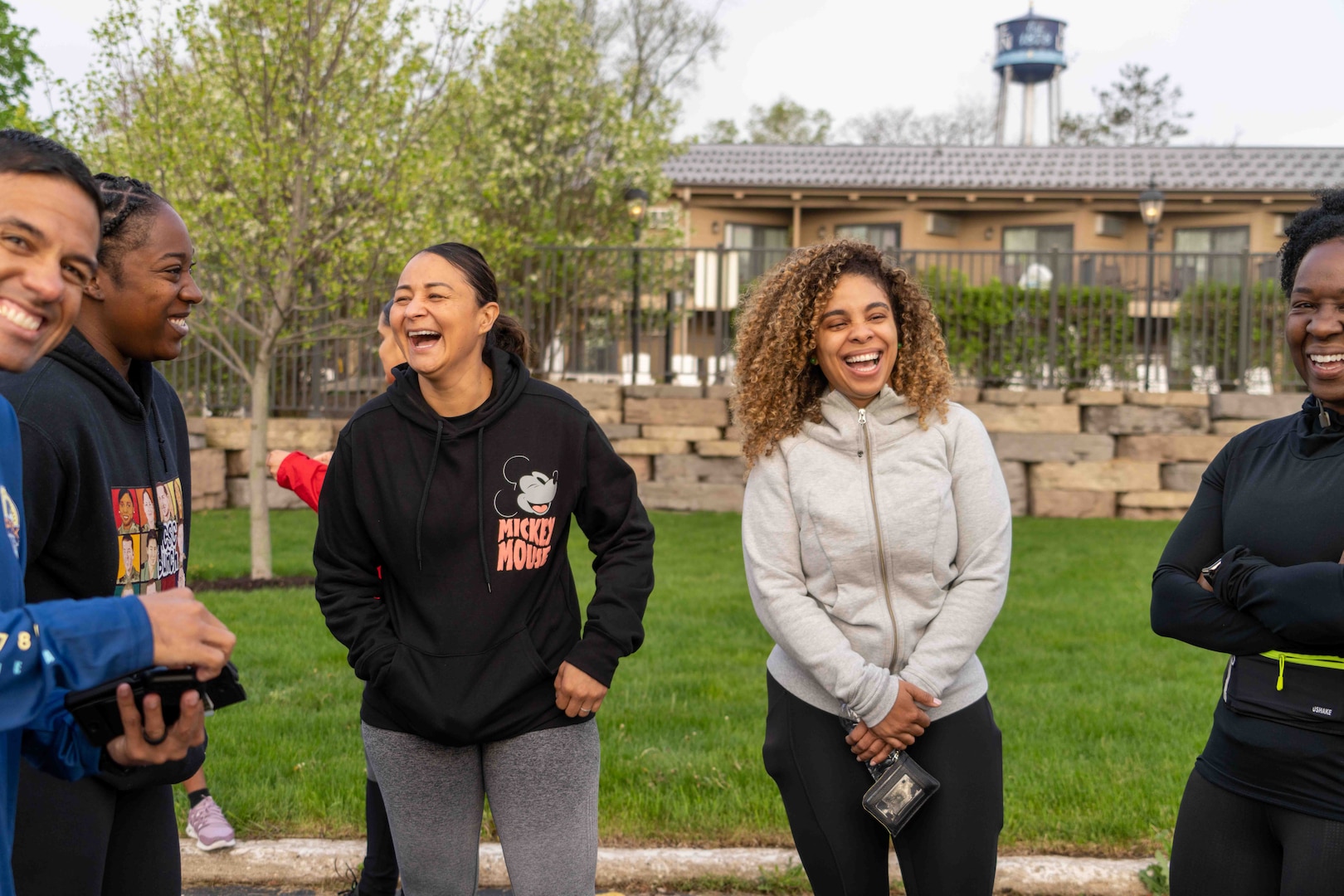 Attendees of the 2023 USMEPCOM Leadership Conference share a laugh before participating in a 5K run. This year marked the first Leadership conference for the command since 2019.
