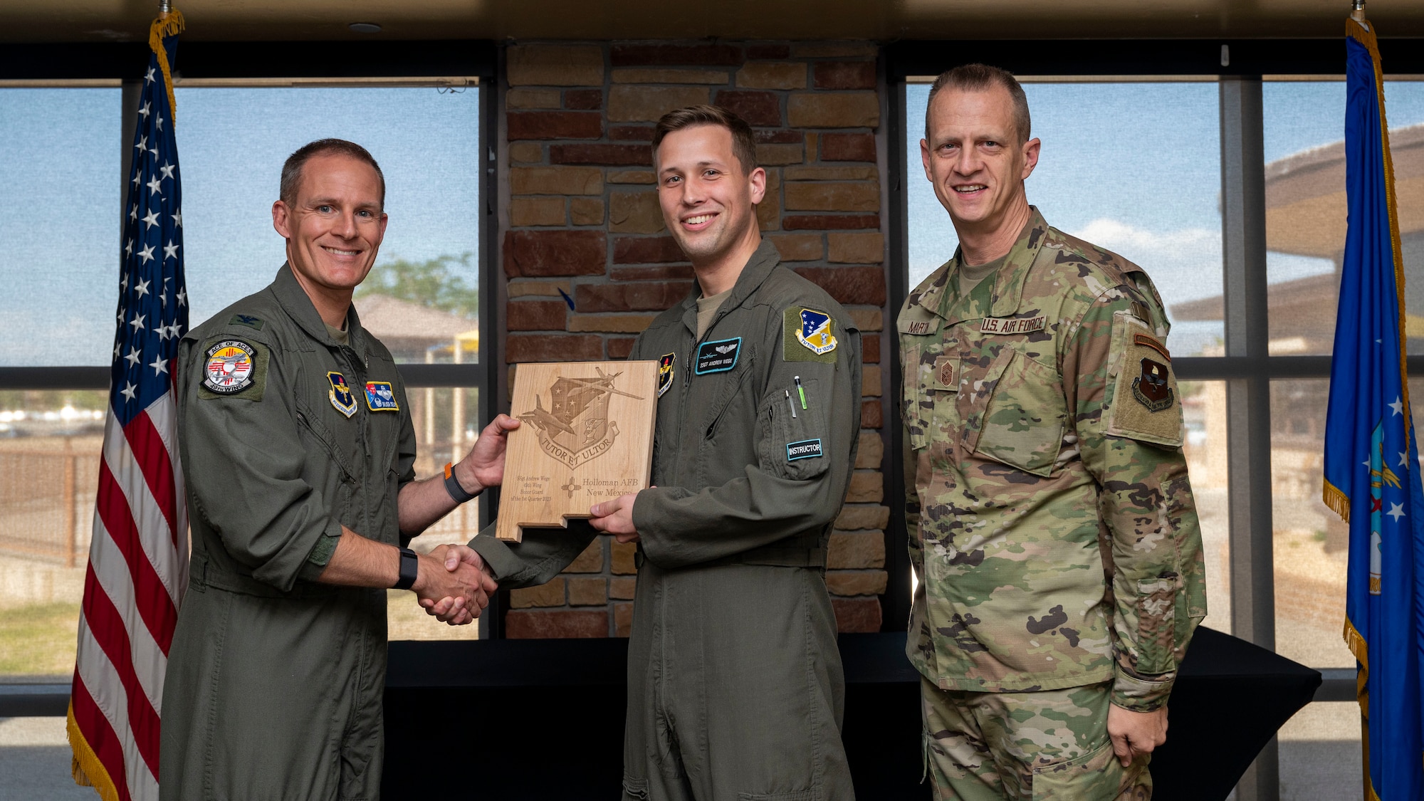 U.S. Air Force Staff Sgt. Andrew Wege, accepts the Honor Guardsman of the Quarter Award, during the 49th Wing’s 1st Quarter Award ceremony at Holloman Air Force Base, New Mexico, May 12, 2023.