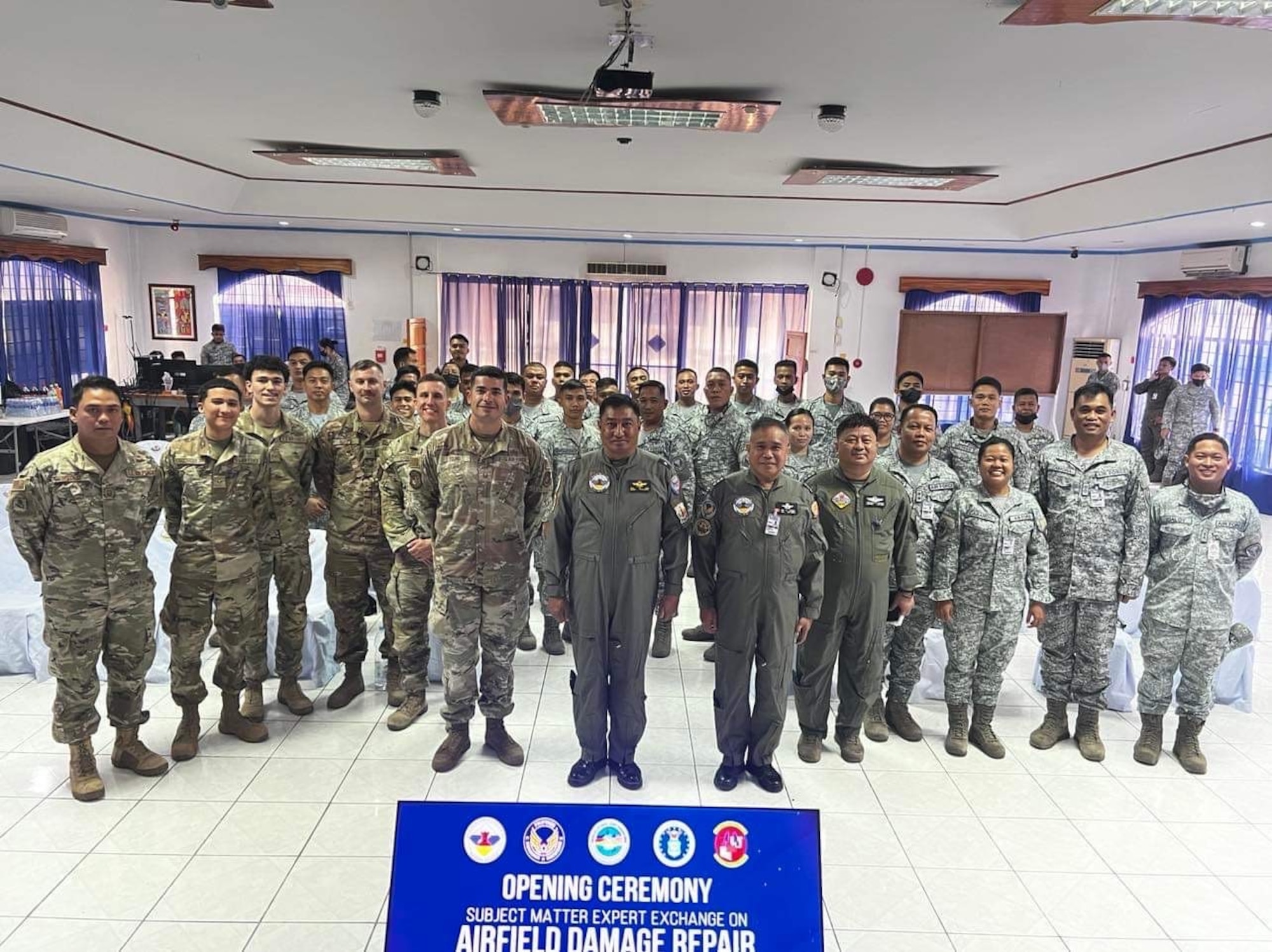 Philippine air force Brig. Gen. Rey Bes and members of both the Philippine and U.S. Air Force attend the opening ceremony of a subject matter expert exchange in the Philippines, Apr. 11, 2023. Bes arrived at the exchange and expressed his excitement for the event and looked forward to continued collaboration as a part of Balikatan exercises in the future. (Courtesy photo from Philippine air force public affairs)
