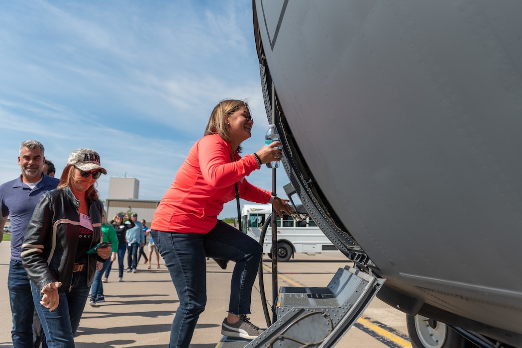 Civilian employers board a C-130H Hercules during a “Breakfast with the Boss” Boss Lift at the 182nd Airlift Wing in Peoria, Illinois, May 11, 2023.