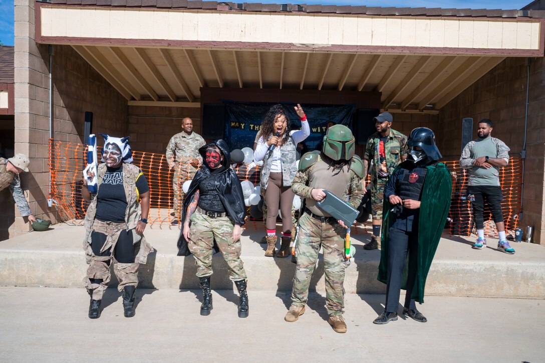 U.S. Air Force Airmen assigned to the 412th Mission Support Group participate in a Star Wars costume contest during a combat dining-in at Edwards Air Force Base, California, May 4, 2023.  A combat dining-in consists of morale activities with unique rules.