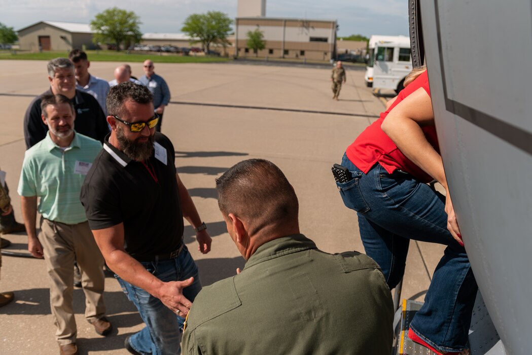 Civilian employers board a C-130H Hercules during a “Breakfast with the Boss” Boss Lift at the 182nd Airlift Wing in Peoria, Illinois, May 11, 2023.