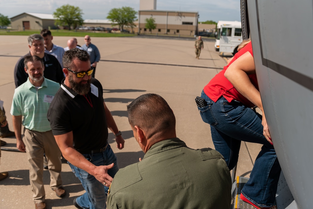 Civilian employers board a C-130H Hercules during a “Breakfast with the Boss” Boss Lift at the 182nd Airlift Wing in Peoria, Illinois, May 11, 2023.