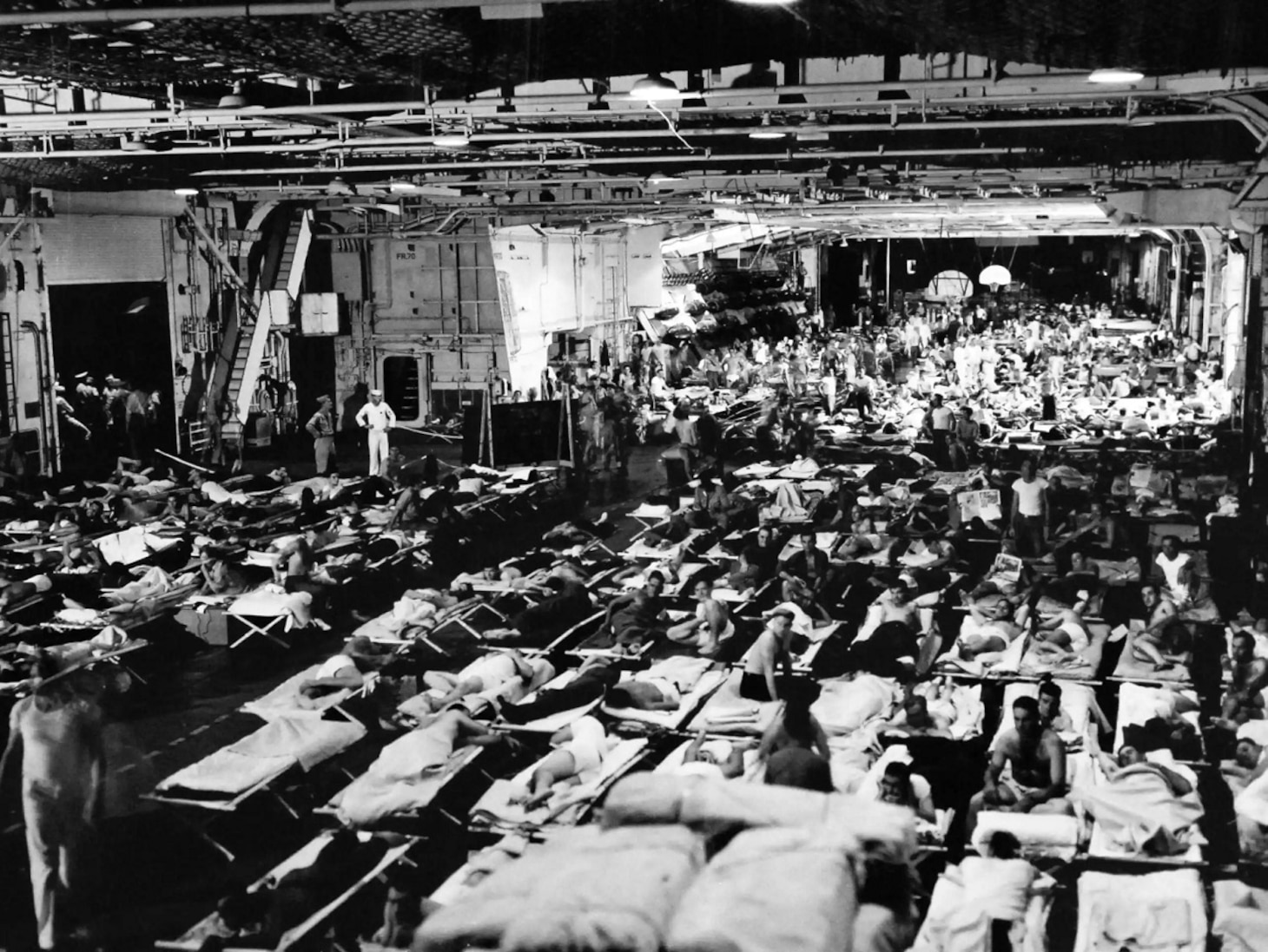 Operation Magic Carpet, ca. 1945. Some 1,200 returning enlistees prepare for bed on the hangar deck of USS Enterprise (CV 6). Image courtesy Naval History and Heritage Command (80-G-495657)