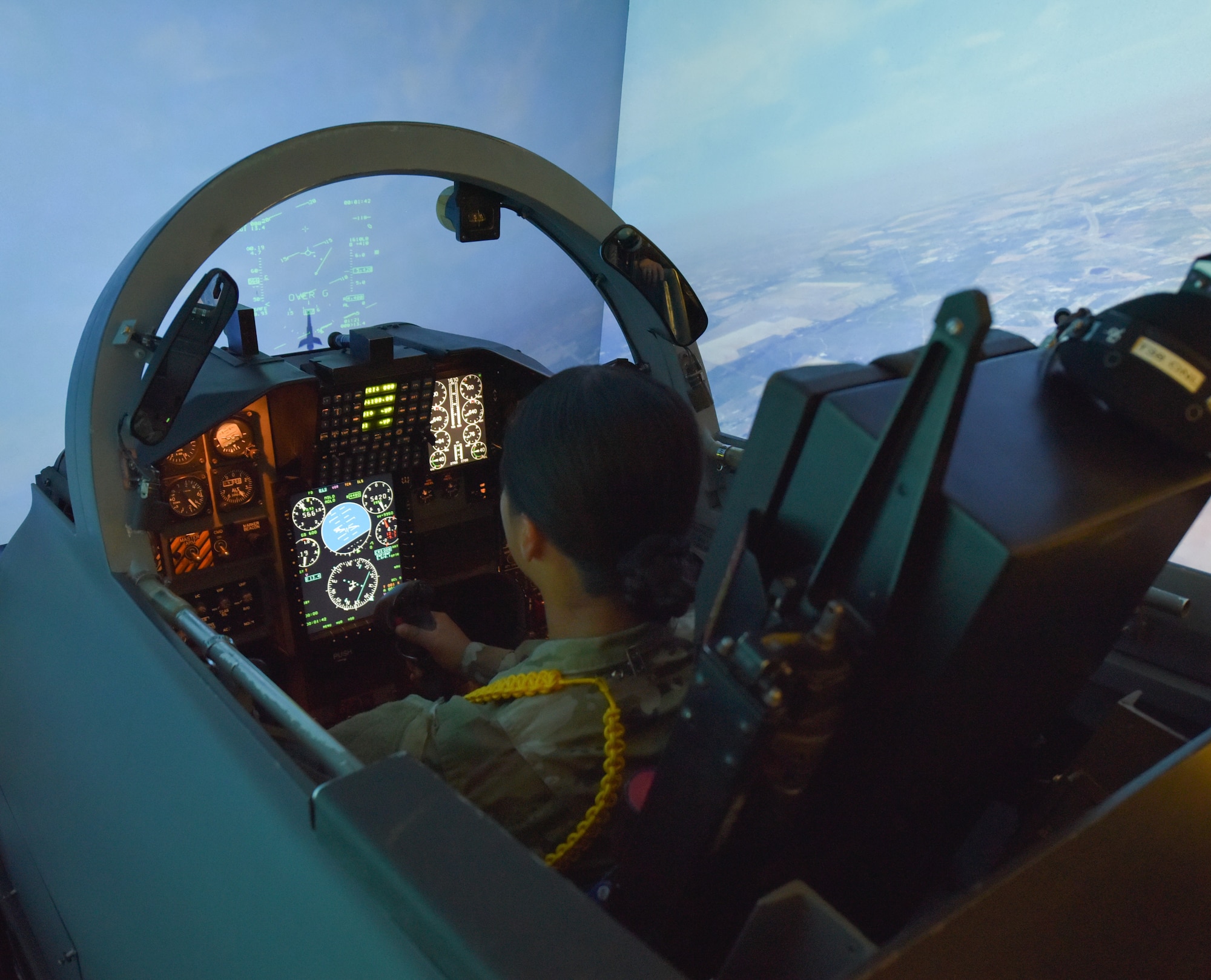 U.S. Air Force Airman in training uses a simulator in Ropes to Flight immersion experience given by the 88th Flying Training Squadron May 5, 2023, at Sheppard Air Force Base, Texas. The Ropes to Flight program educates enlisted Airmen on opportunities to become pilots. (U.S. Air Force photo by Julie Svoboda)