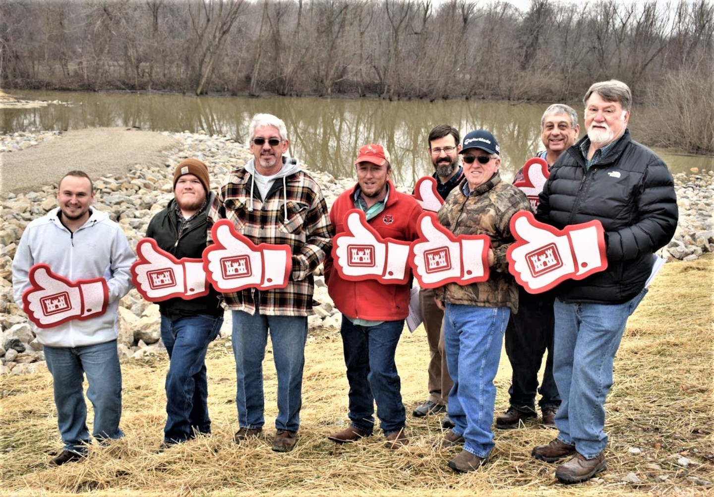 On Jan. 16, 2019, the Memphis District conducted its final inspection of contracted work on the Nimmons Scour Repair Project. The project repaired a scour that occurred near the west bank (right descending) of the St. Francis River Levee in Clay County, Arkansas. Work on the $237,000 project was completed by C&M Contractors and managed by the Memphis District in partnership with the St. Francis Drainage District.  

IN THE PHOTO: From left to right, Memphis District’s Bryan Putt, Jacob Allen, and Jack Ratliff; Shaun Bass, C&M Contractors; Josh Giannini, Memphis District; Charlie Bass, C&M Contractors, J.R. Holloway, Memphis District, and Steve Kuykendall, Memphis District together give the project a thumbs-up.