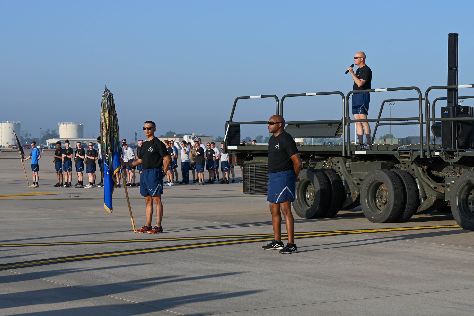U.S. Air Force Col. Blaine Baker, 97th Air Mobility Wing (AMW) commander, addresses Airmen from the 97th AMW on the flight line at Altus Air Force Base, Oklahoma, May 12, 2023. This was Baker’s final run with the wing due to his upcoming change of command ceremony. (U.S. Air Force photo by Senior Airman Trenton Jancze)