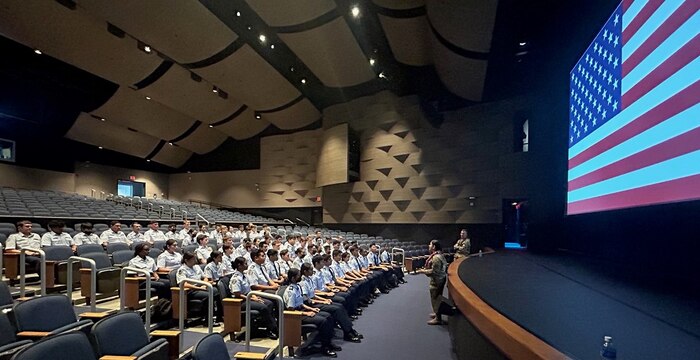 Chief Master Sgt. Gilda M. Alexander, the Jeanne M. Holm Center for Officer Accessions and Citizen Development Command Chief, Maxwell AFB, AL, speaks to a group of Air Force Junior ROTC cadets at Joint Base Pearl Harbor-Hickam Hawaii