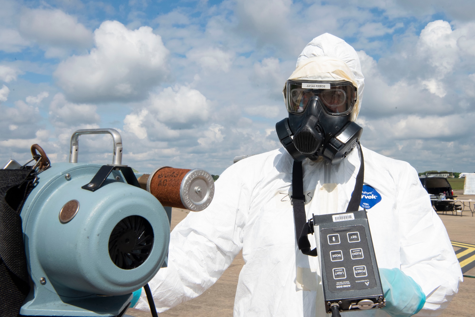 U.S. Air Force Staff. Sgt. Ismael Zayas Ramos, 100th Civil Engineer Squadron emergency management training NCO in charge operates radiation detection equipment during an Aircraft Radiological Recovery Plan training event at Royal Air Force Mildenhall, England, May 11, 2023. The WC-135 Constant Phoenix aircraft is a modified C-135R platform and its modifications are primarily related to its onboard atmospheric collection suite which allows the mission crew to detect and collect radioactive debris in real time. (U.S. Air Force photo by Tech. Sgt. Anthony Hetlage)