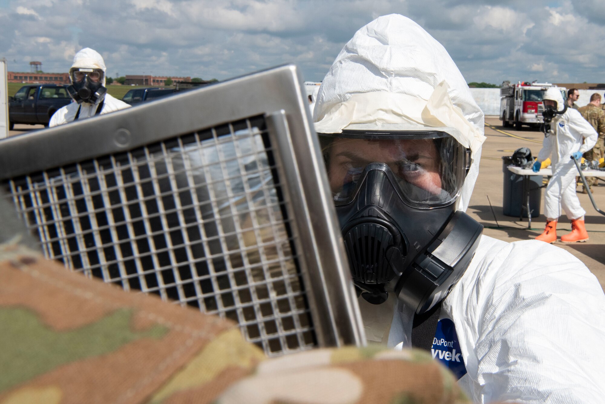 U.S. Air Force Airman 1st Class Miranda Dickinson, 100th Civil Engineer Squadron emergency management journeyman scans an Airman for contamination during an Aircraft Radiological Recovery Plan training event at Royal Air Force Mildenhall, England, May 11, 2023. The WC-135 Constant Phoenix aircraft is currently the only aircraft in the Air Force inventory that conducts air sampling operations. The ability to evaluate radionuclides in the atmosphere enhances the Air Force Technical Applications Center’s ability to monitor Limited Test Ban Treaty of 1963 compliance. (U.S. Air Force photo by Tech. Sgt. Anthony Hetlage)