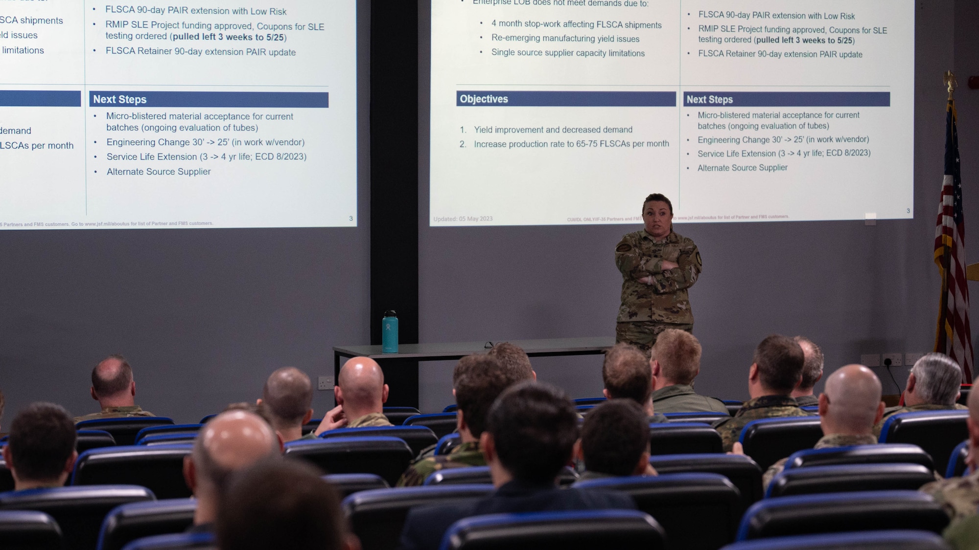 U.S. Air Force Lt. Col. Jessica Wright, materiel leader for aircraft and pilot systems, briefs the F-35 User Group about egress systems at Royal Air Force Lakenheath, England, May 9, 2023. The purpose of the UG is to provide a forum for identification of, and solution to, theater challenges; enhance theater-wide F-35 interoperability, and aid in the sharing of enterprise level solutions. (U.S. Air Force photo by Airman 1st Class Austin Salazar)