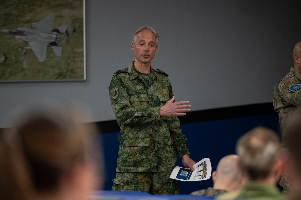 Royal Netherlands Air Force Maj. Marcel Voorsluijs, European Air Group representative, discusses interoperability of F-35 technicians to the F-35 User Group at Royal Air Force Lakenheath, England, May 10, 2023. The F-35 European Air Chiefs meet biannually to discuss User Group issues and provide guidance, with the most recent meeting hosted by Italy in November 2022 and the next meeting scheduled for June 2023 at RAF Marham. (U.S. Air Force photo by Airman 1st Class Austin Salazar)