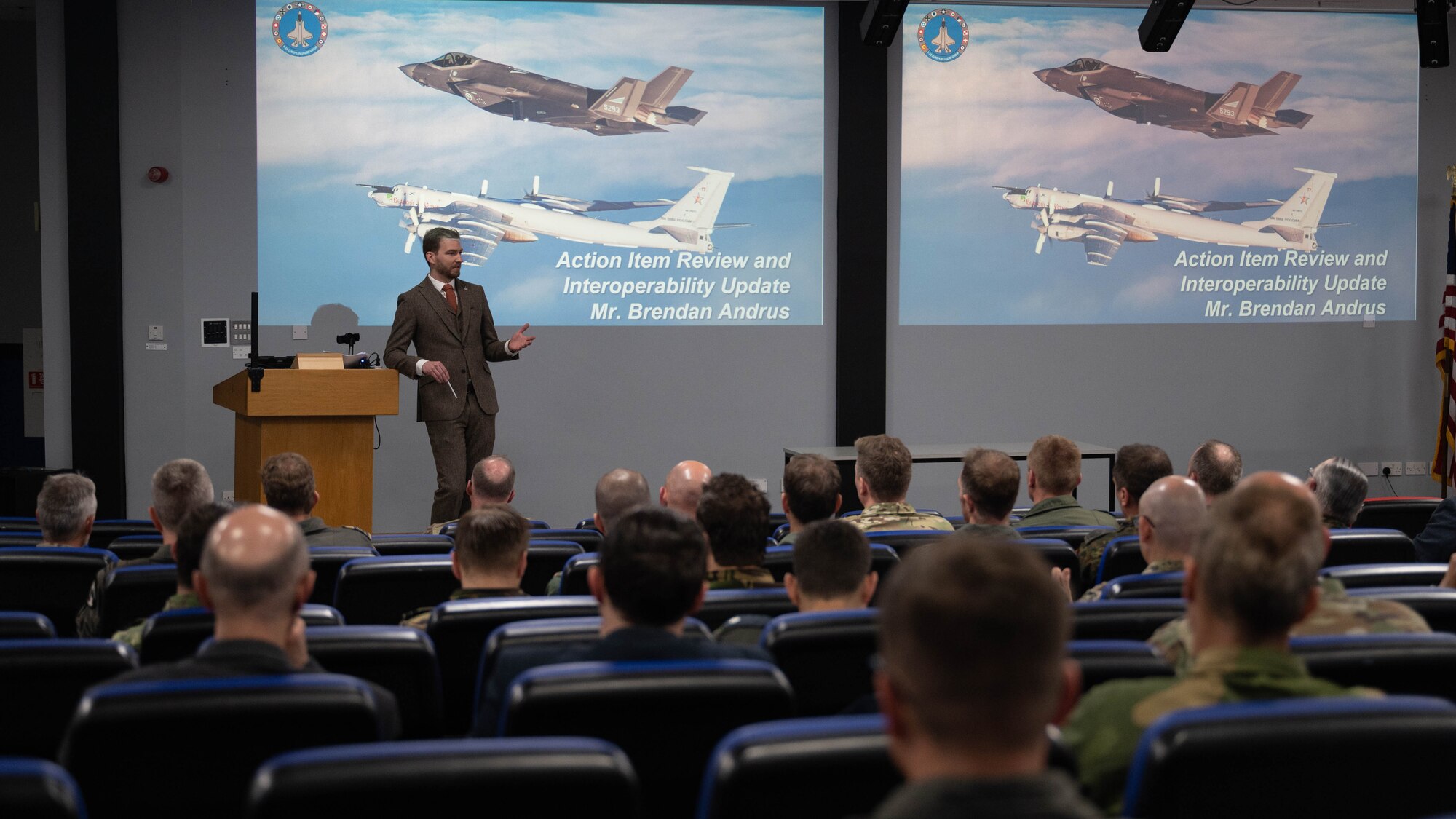 Brendan Andrus, U.S. Air Forces in Europe Air Force chief of fifth generation integration branch, gives opening remarks to the F-35 User Group at Royal Air Force Lakenheath, England, May 9, 2023. The F-35 European Air Chiefs meet biannually to discuss User Group issues and provide guidance, with the most recent meeting hosted by Italy in November 2022 and the next meeting scheduled for June 2023 at RAF Marham. (U.S. Air Force photo by Airman 1st Class Austin Salazar)