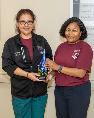 Eagle Zone, Bldg. 10, Ward 4 Center:
RN Amarilys Patterson, winner of the RN Nightingale Award

The Nightingale Awards recognize members of the nursing team serving at Walter Reed National Military Medical Center as proven leaders who consistently exemplify ambition, commitment, professionalism, courage, outstanding care, and teamwork.

Photograph by Harvey A. Duze (Office of Command Communications – WRNMMC)