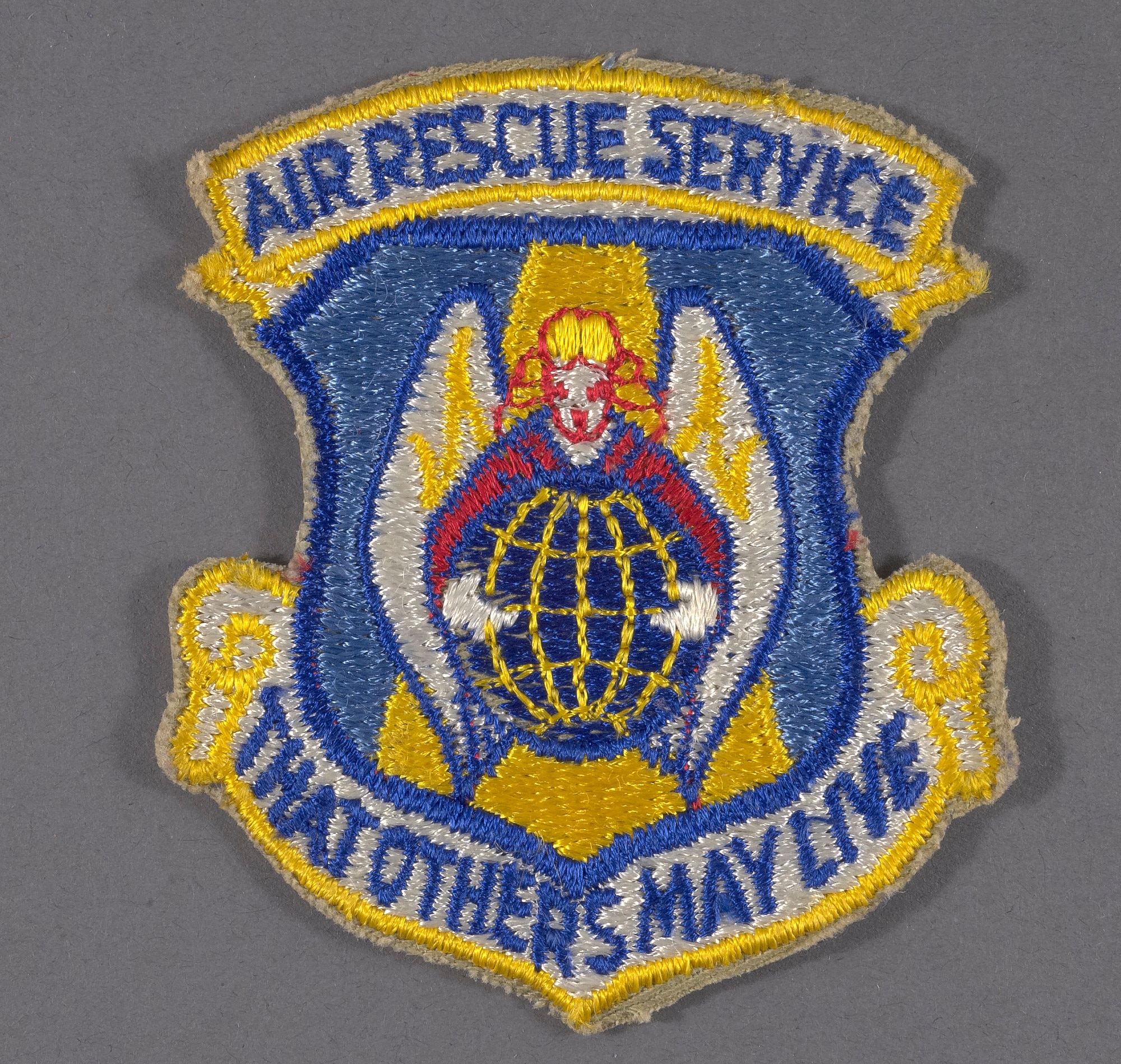 Early Air Rescue Service insignia depicts the unit’s global search and rescue mission.