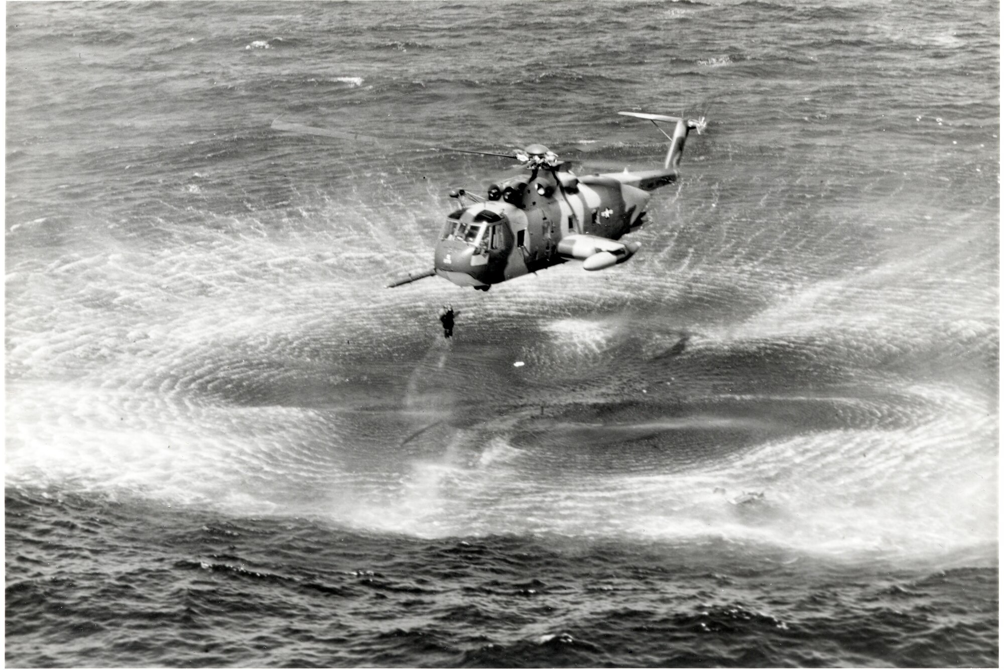 A PJ rescues a pilot from the Gulf of Tonkin during a search and rescue mission in Southeast Asia.