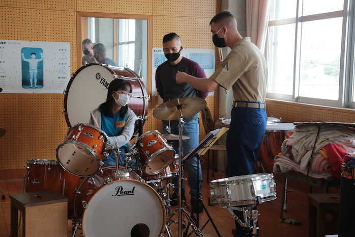 Members of the III MEF band rehearsed together with students at the last hour of the clinic.