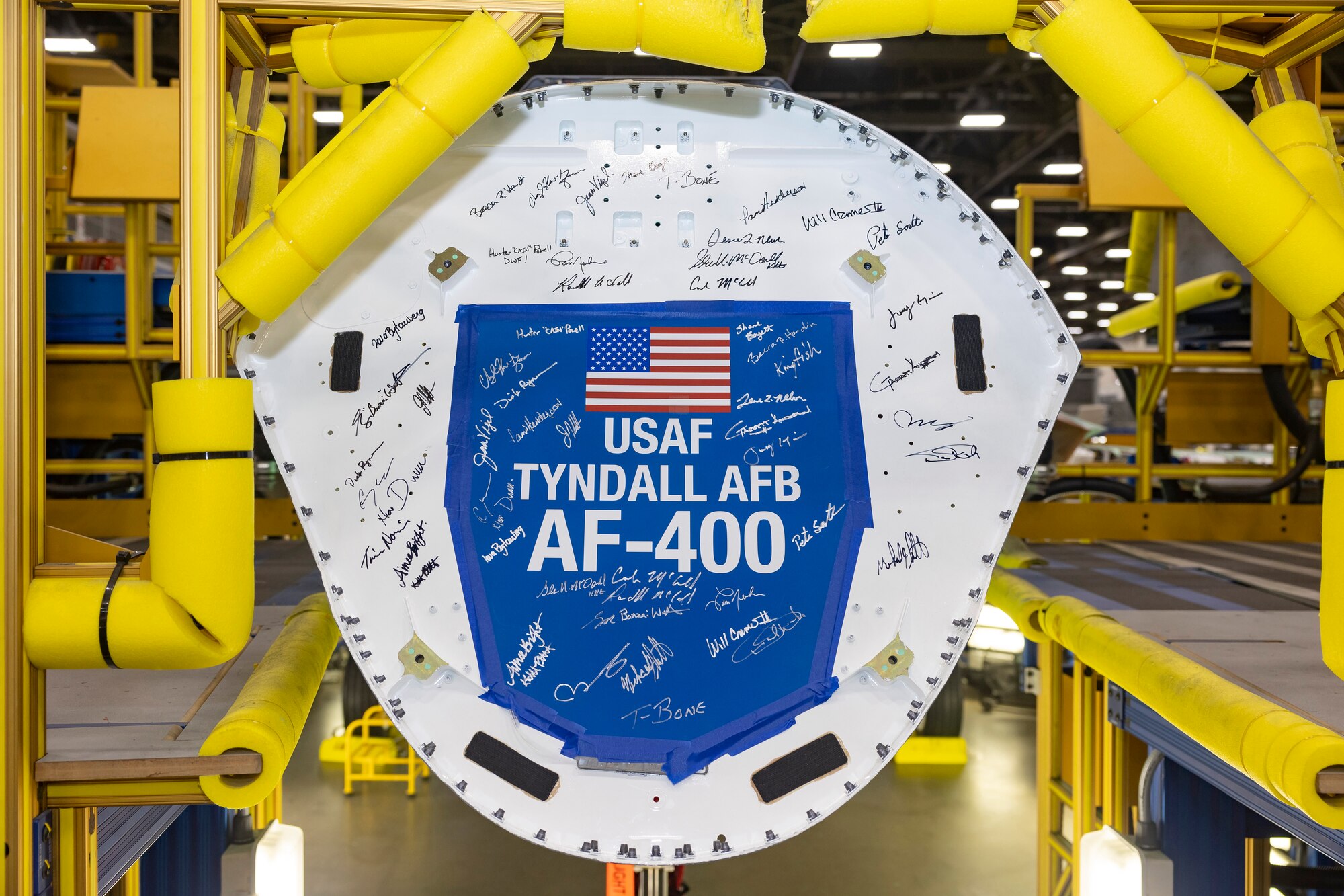 Part of a signed F-35A Lightning II sits on displayed