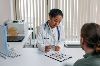 Medical provider meets with patient