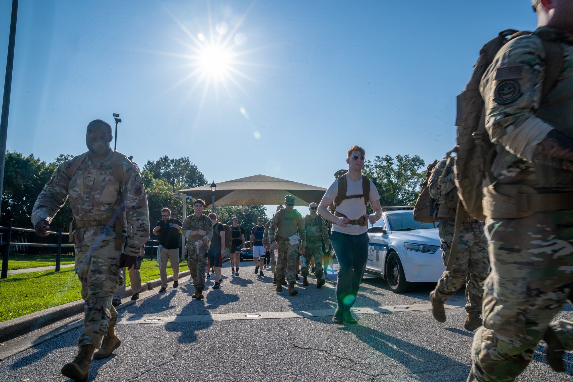 Airmen from the 81st Security Forces Squadron begin the National Police Week 5K Memorial Ruck at Keesler Air Force Base, Mississippi, May 16, 2023.