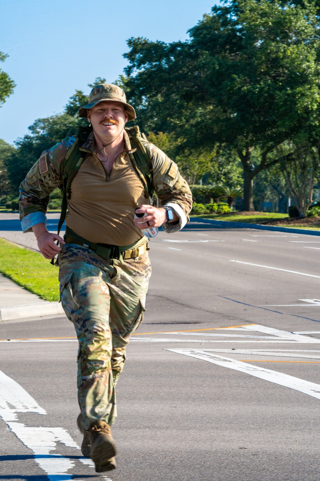 U.S. Air Force Staff Sgt. Anthony Ryan, 81st Security Forces Squadron armory NCO in charge, participates in the National Police Week 5K Memorial Ruck at Keesler Air Force Base, Mississippi, May 16, 2023.