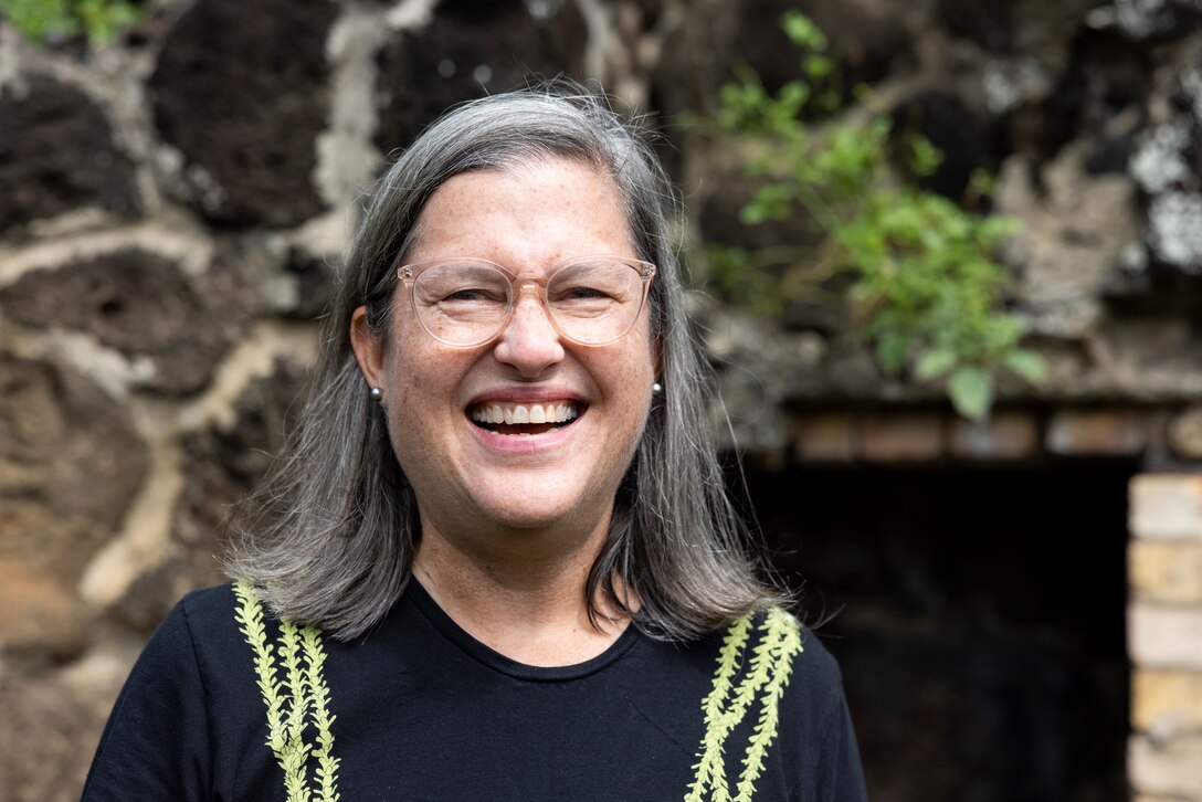 June Noelani Cleghorn, senior cultural resources manager, Environmental Compliance and Protection Division, Marine Corps Base Hawaii, poses for a photo, MCBH, March 30, 2023. The ECPD carries out the functions of compliance, pollution prevention, conservation, installation restoration, training and education, and outreach at MCBH. (U.S. Marine Corps photo by Cpl. Samantha Sanchez)