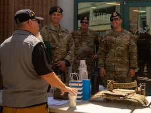 A U.S. Army veteran speaks with members of the 56th Security Forces Squadron May 16, 2023, at Luke Air Force Base, Arizona.