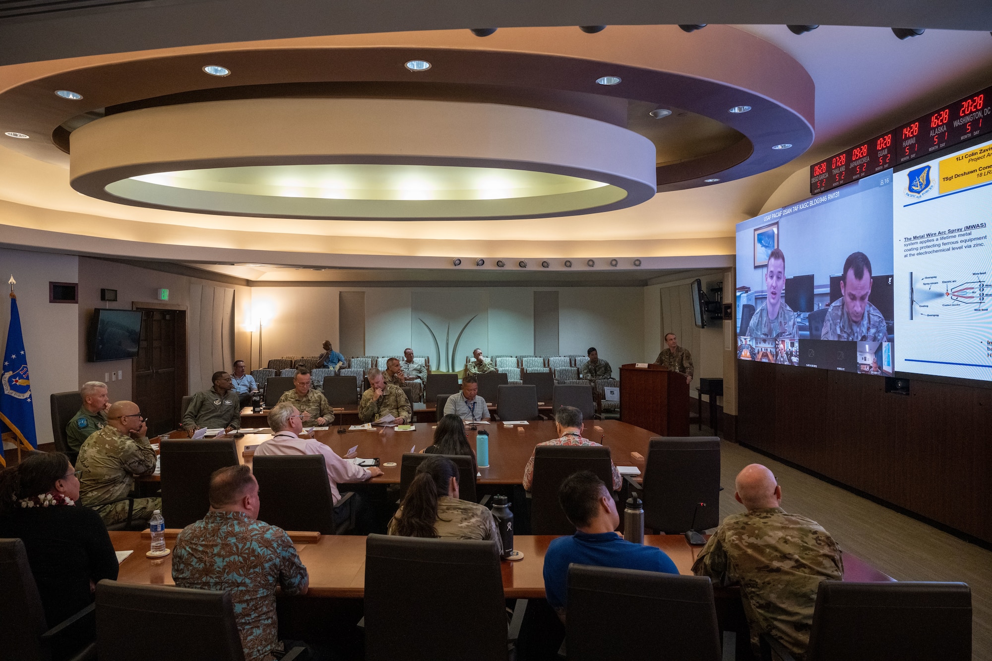 Photo of attendees listening to a brief