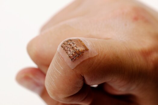  A soft ultrasonic patch that continuously measures blood pressure waveforms was a project previously developed by the Nano-Bio Materials Consortium, or NBMC, in collaboration with the University of California San Diego. The NBMC, led by the Air Force Research Laboratory, or AFRL, in partnership with primary contractor Semiconductor Equipment Materials International, or SEMI, has publicly released a request for proposals for dual-use projects designed to accelerate innovations in Smart MedTech, a field that encompasses human performance monitoring and augmentation. AFRL has provided approximately $4.5 million in primary funding for the 2023 call for proposals as part of its mission to address key capability and technology gaps in the Smart MedTech arena. (U.S. Air Force photo / Mary Pacinda)