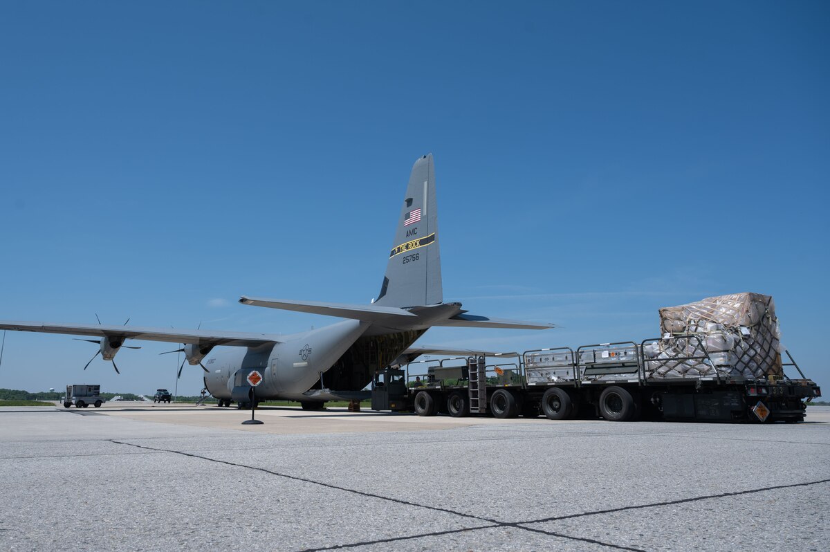 Cargo bound for Switzerland is loaded onto a C-130J Super Hercules, assigned to the 19th Airlift Wing at Little Rock Air Force Base, Arkansas, during a foreign military sales mission at Dover Air Force Base, Delaware, May 14, 2023. The U.S. established diplomatic relations with Switzerland in 1853, following the formation of a unified Swiss state. (U.S. Air Force photo by Senior Airman Cydney Lee)